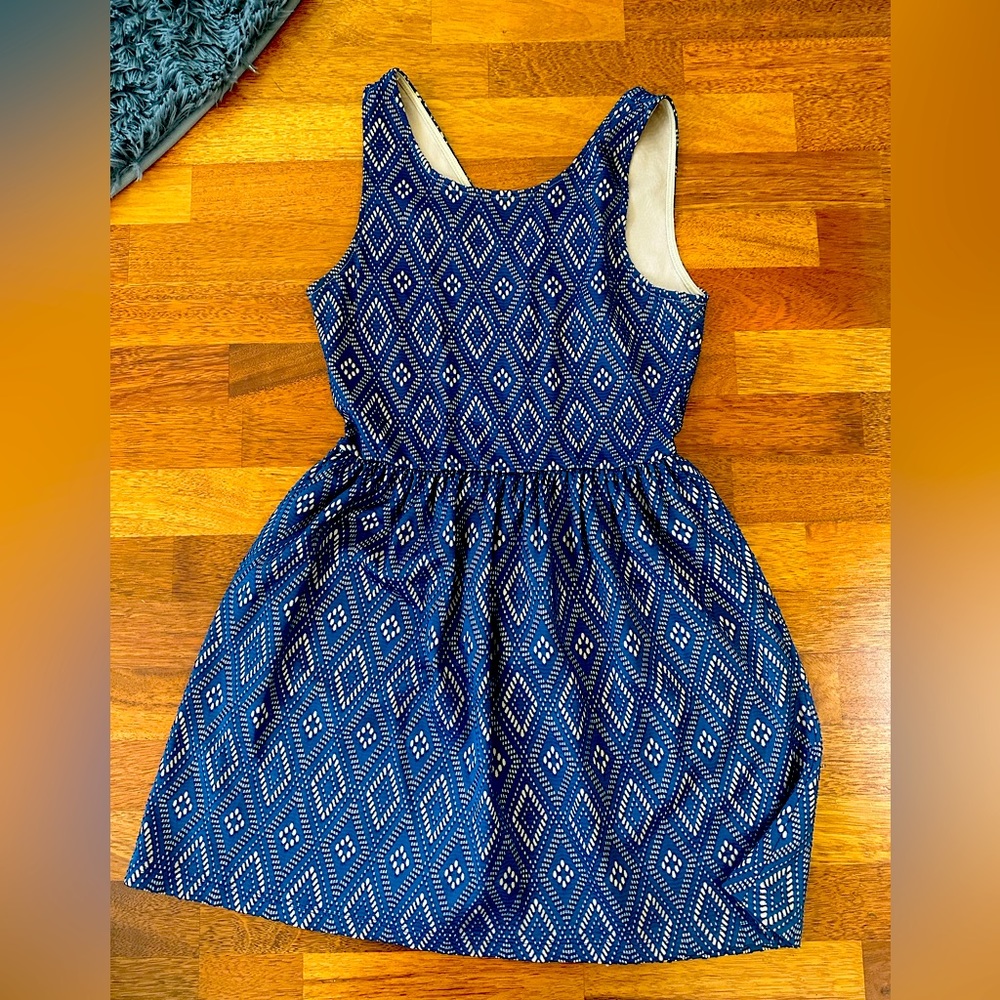 Francesca’s flattering dress in medium.